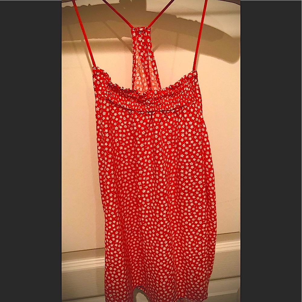 Orange floral spaghetti strap tank top.